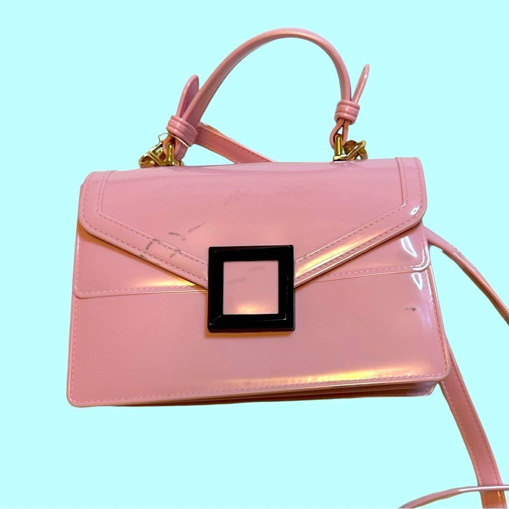 y2K barbie pink PVC purse with long adjustable strap. barbie core y2k style